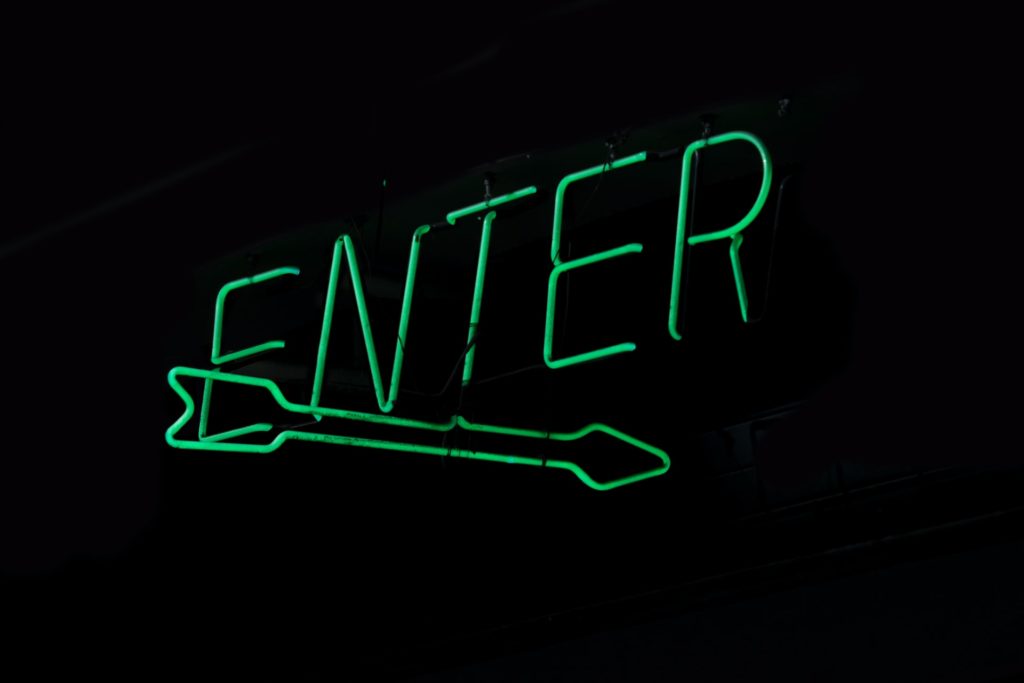 "Enter" sign Photo by Jude Beck on Unsplash